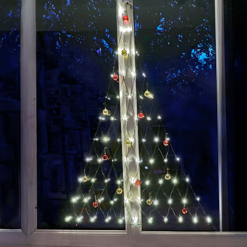 Sapin lumineux fenêtre