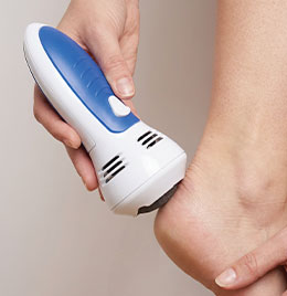 Râpe électrique aspirante pieds